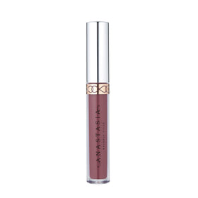 Anastasia Beverly Hills Dusty Rose on lips showing a soft matte rosy nude finish.