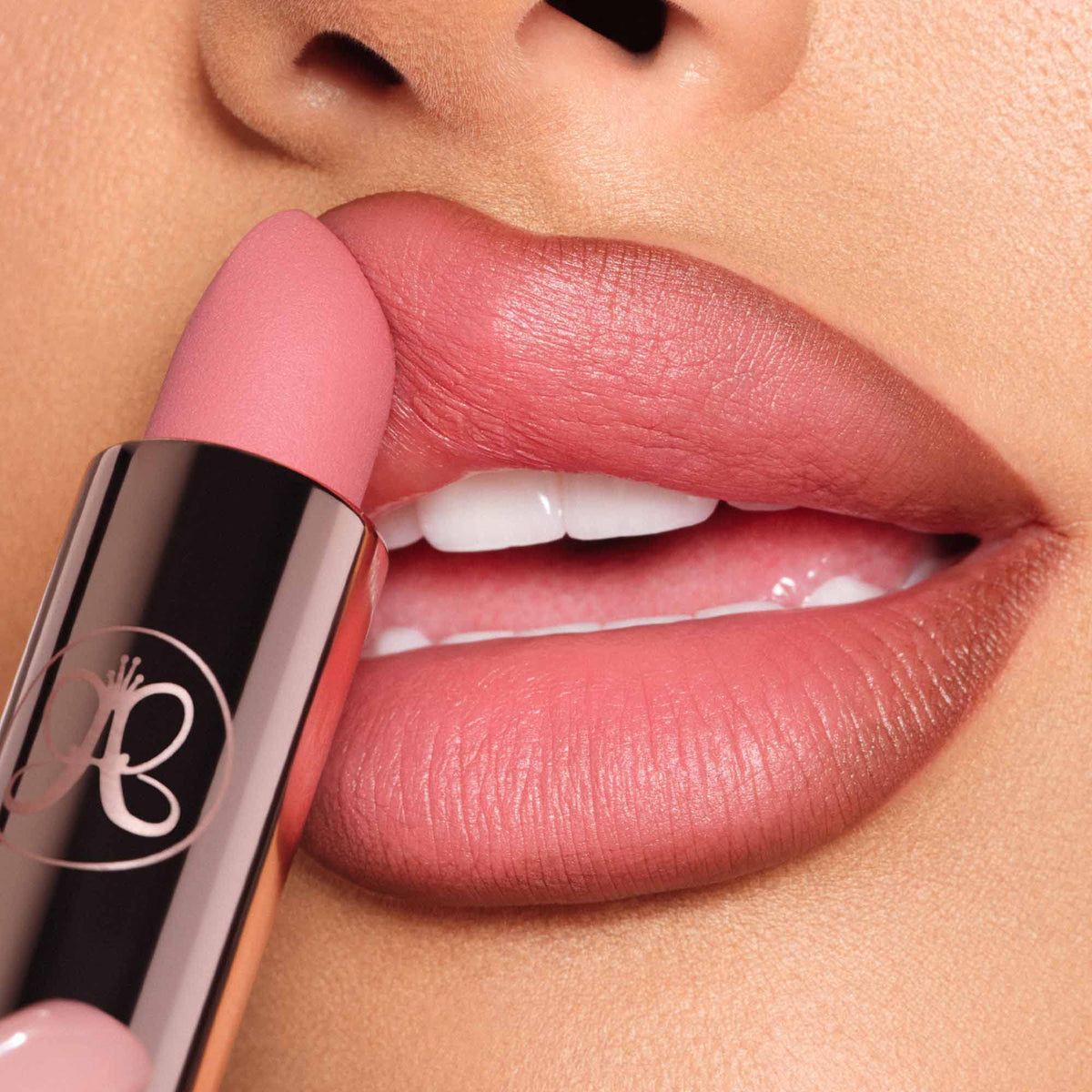 Anastasia Beverly Hills Matte Lipstick Blush Brown lip application with even color payoff