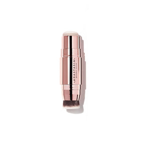 Anastasia Beverly Hills Stick Highlighter Pink Diamonds glides on cheekbone for a soft glow.