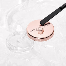 Compact Brow Freeze tool for on-the-go brow shaping.