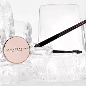Close-up of Brow Freeze dual-ended applicator enabling natural to bold looks.