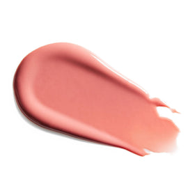 Tan Rose lip gloss on lips providing a smooth radiant shine