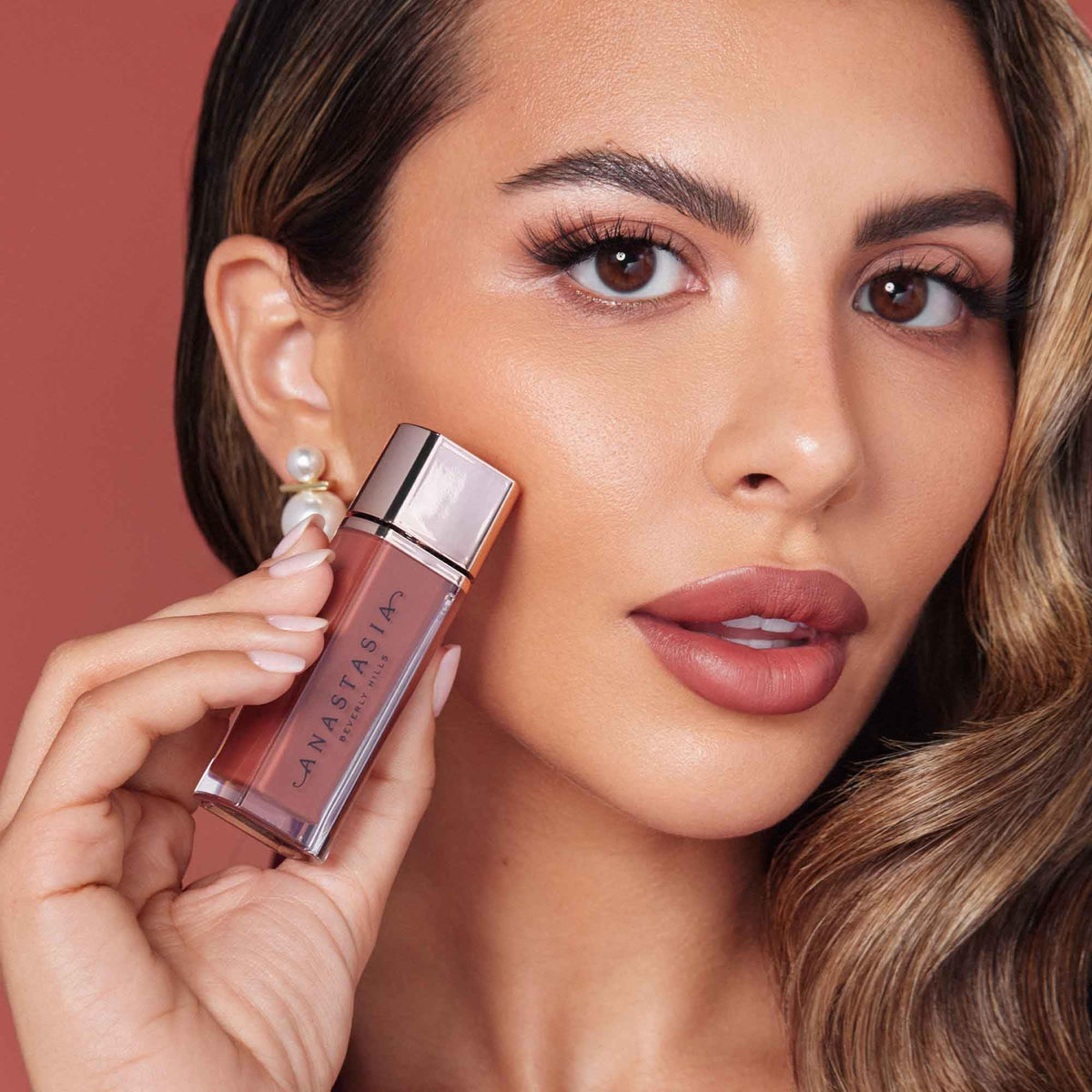 Lip Velvet Parchment on lips reveals weightless feel with true-matte color.