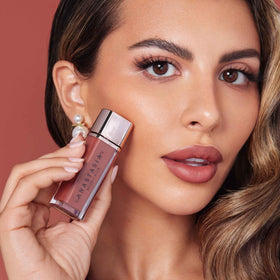 Lip Velvet Parchment on lips reveals weightless feel with true-matte color.