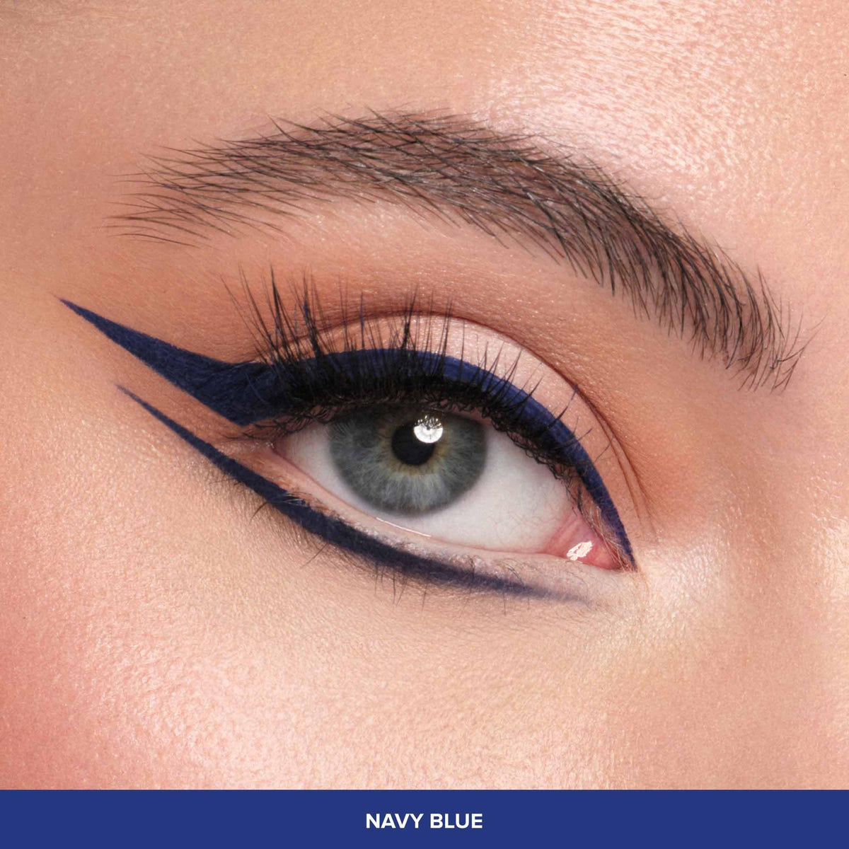 Anastasia Beverly Hills navy blue liner swatches on hand show color payoff.