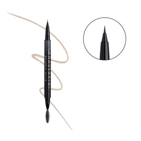 Close-up of the micro-fine brush delivering buildable color for defined brows.