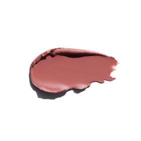 An Anastasia Beverly Hills satin lipstick taupe beige swatch shows rich color payoff.