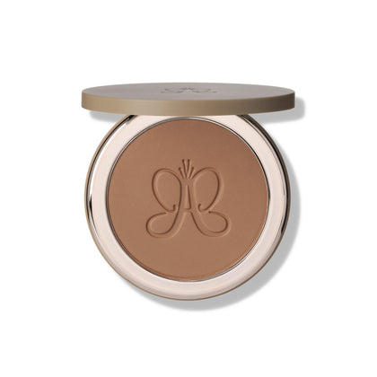 Anastasia Beverly Hills Smooth Blur Bronzer Tropical Tan compact close-up shows silky texture.