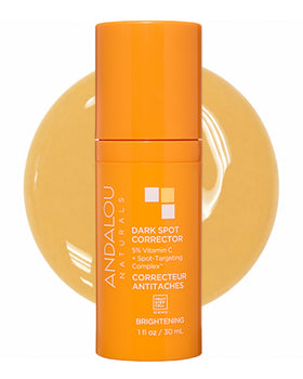 Andalou Naturals dark spot corrector bottle targets uneven tone for radiant skin.