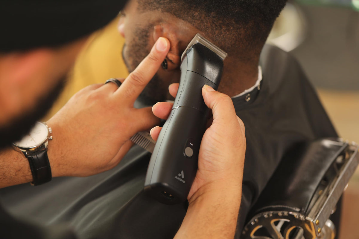 Andis eMERGE professional-use-clipper designed for barbers and stylists seeking versatility.