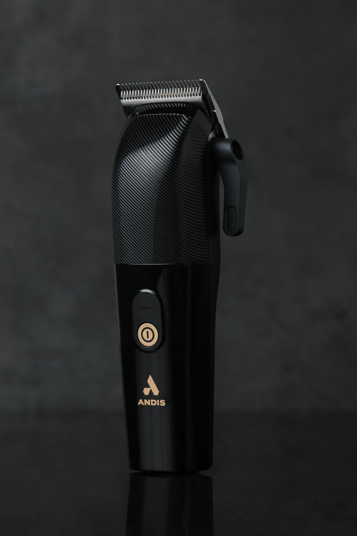 Andis Envy II black finish on a professional station.
