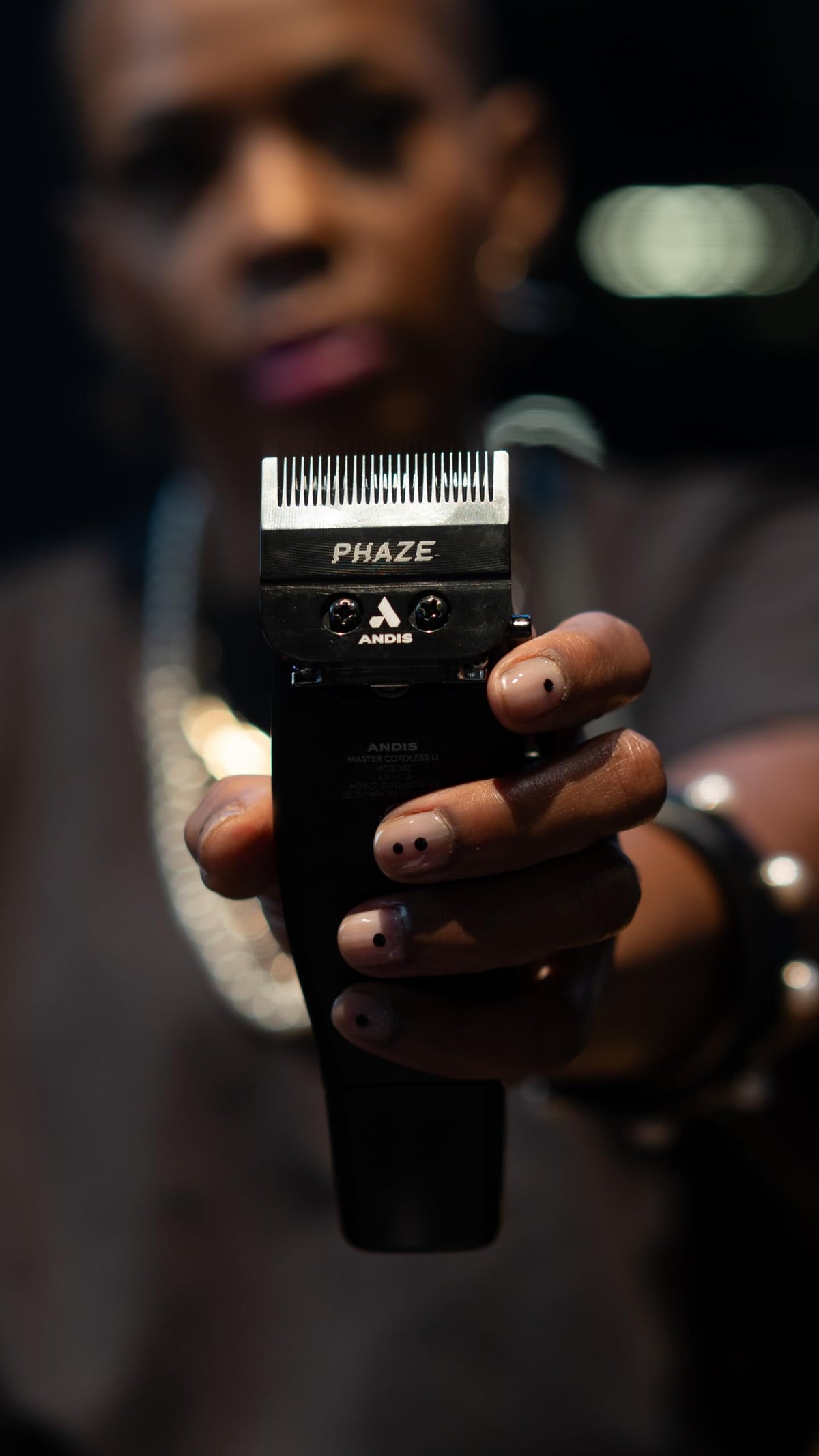 Andis Phaze blade adjusted from 0000 to 0A enables versatile fades.