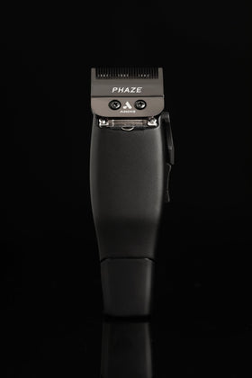 Andis Phaze carbon-steel blade designed for durable, sharp performance.