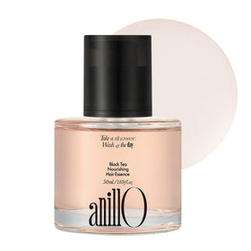 ANILLO Black Tea Nourishing Hair Essence bottle-pour for lightweight hydration and shine