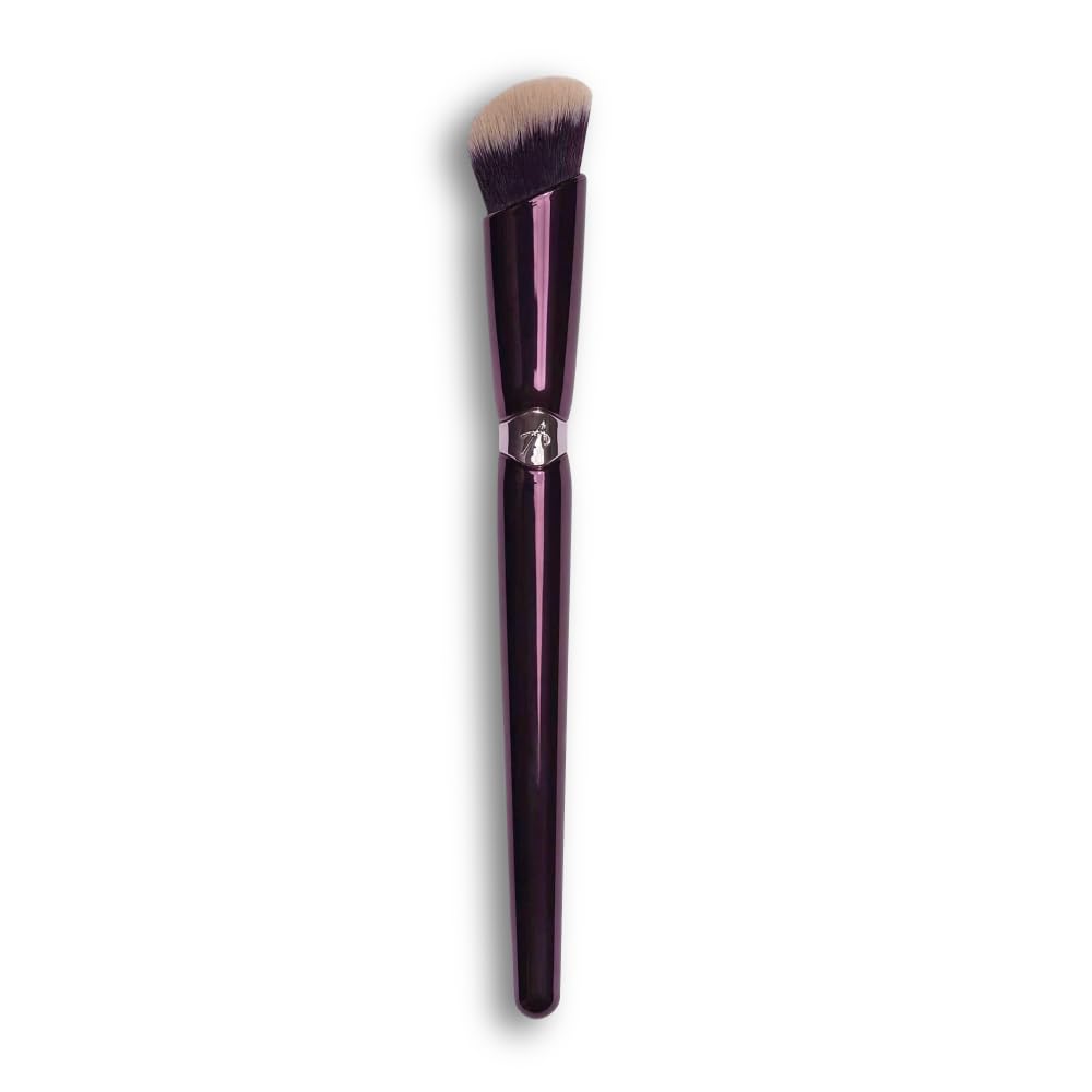 ANISA BEAUTY angled concealer brush close-up shows soft vegan bristles for precise blending.
