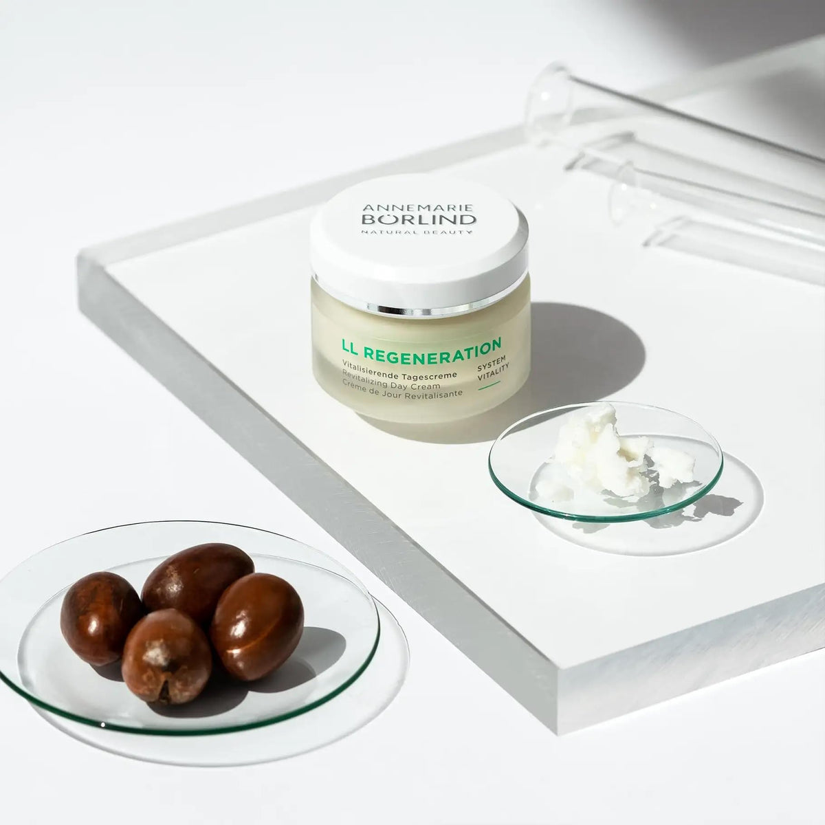 ANNEMARIE BÖRLIND LL REGENERATION hand application demonstrates daily-use cream.