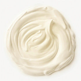 Cream spreads on skin in this shot for smoother texture after use.