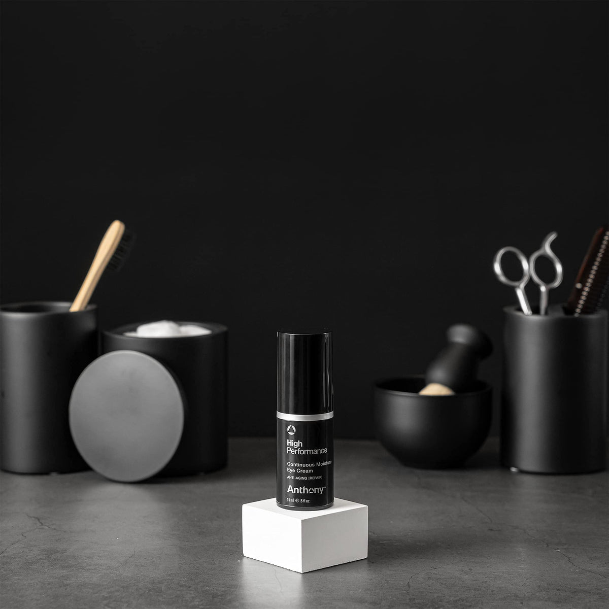 Anthony High-Performance Eye Cream being applied under the eye for potential puffiness support.