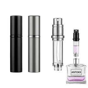 ANTOKX travel perfume atomizer front view in black and gray, compact and ready for travel.