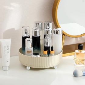 Anyoifax lazy Susan vanity stand keeps cosmetics neatly visible and reachable