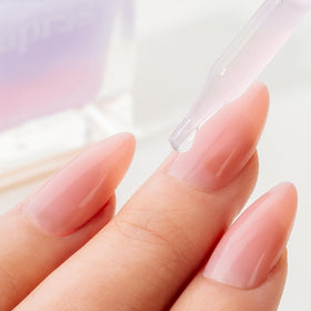 APRÉS serum texture close-up reveals silky, non-greasy finish after application.