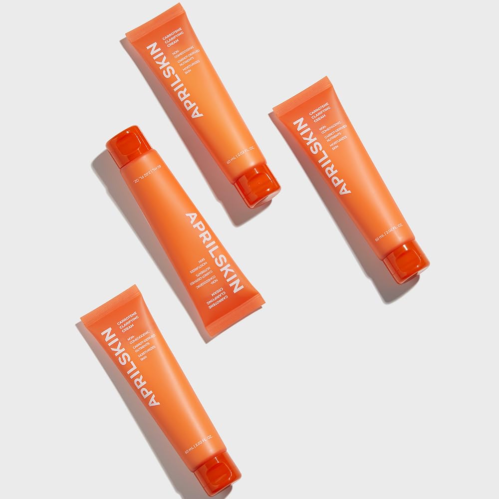 Applying APRILSKIN Carrotene Clarifying Cream from center outward for even coverage.
