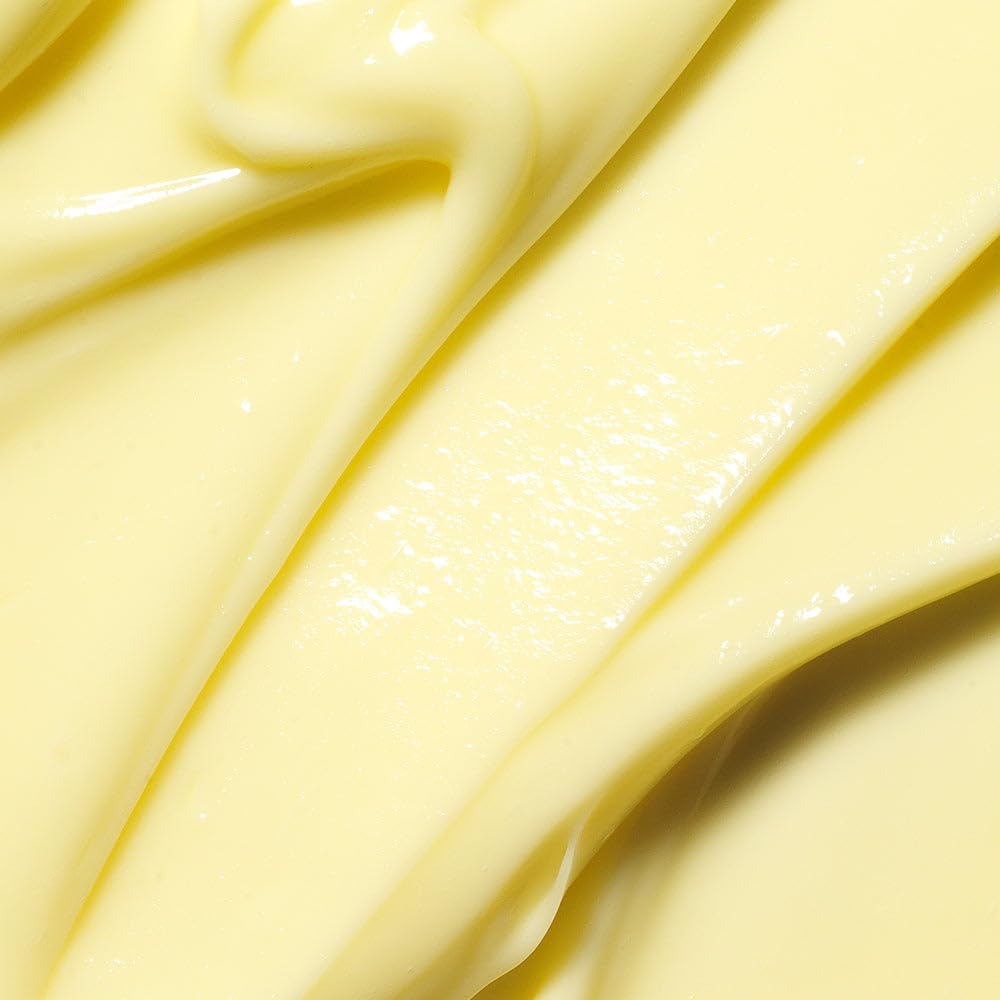 Close-up of APRILSKIN Carrotene Clarifying Cream texture on skin surface.