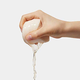 APRILSKIN Carrotene pad close-up showing exfoliating texture.