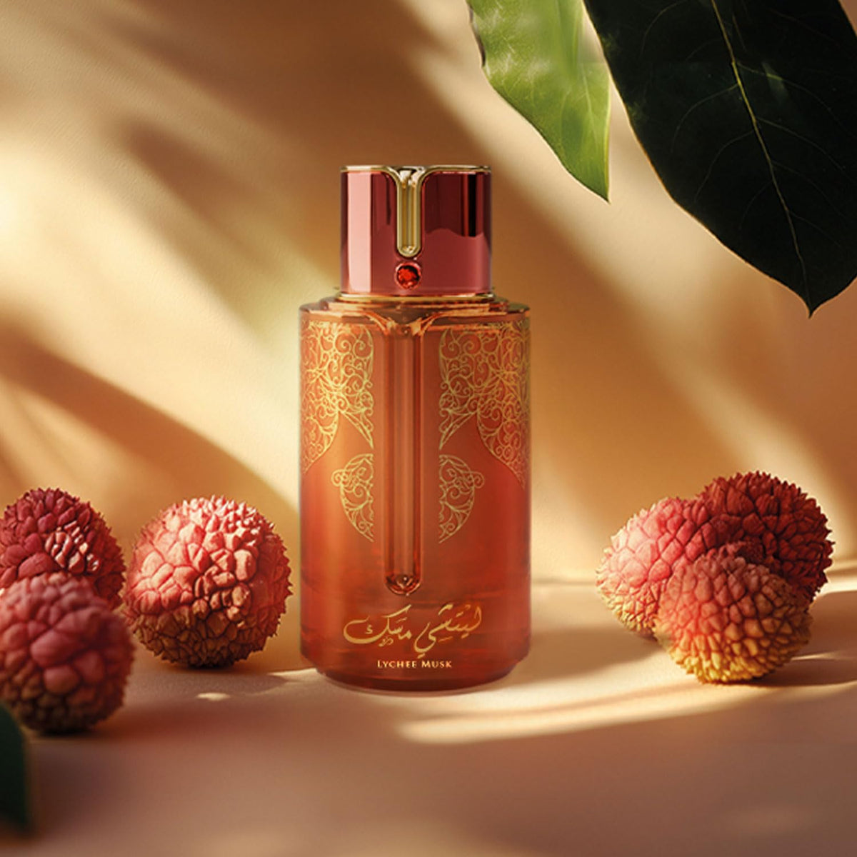 ARABIYAT Prestige Lychee Musk bottle rose-heart detail emphasizes balanced floral note.