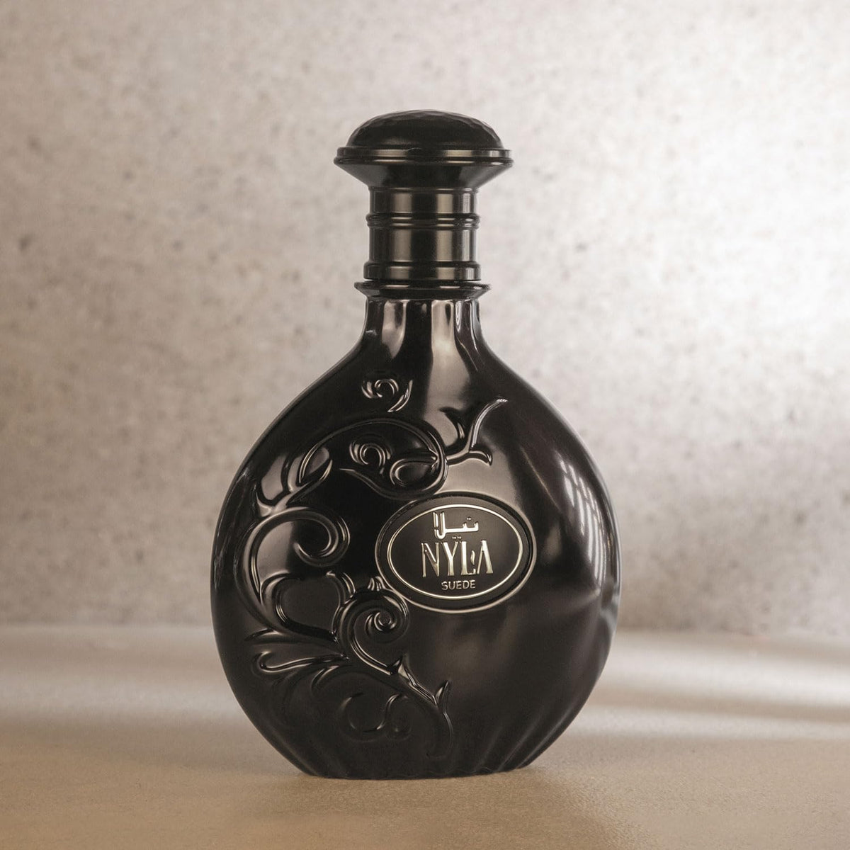 ARABIYAT Nyla Suede bottle cap highlights luxurious packaging for gifting