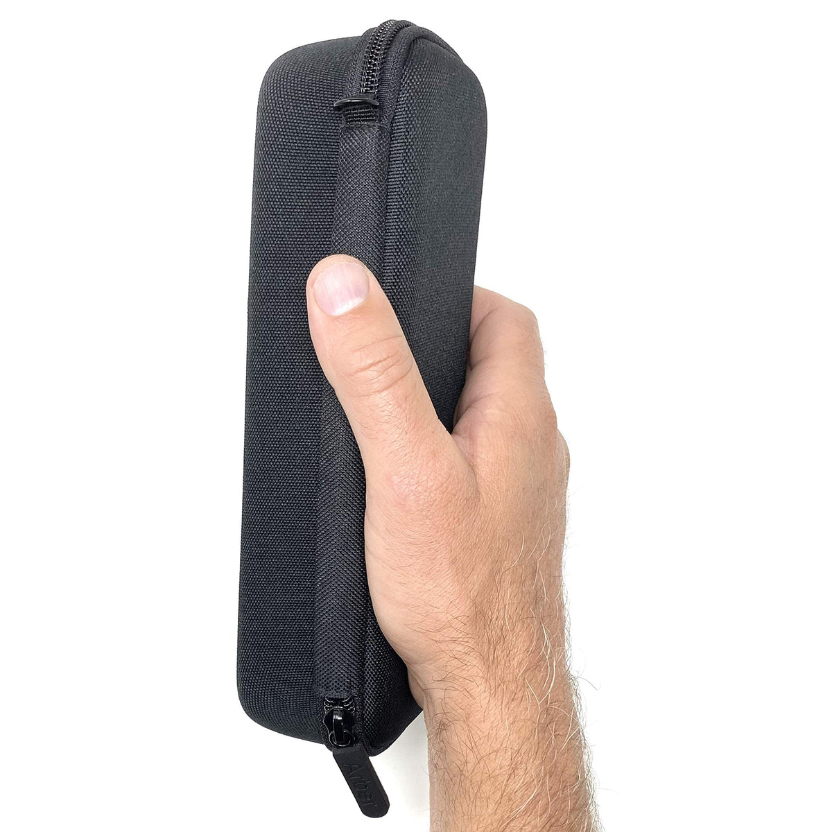 Arber travel-ready case keeps trimmer safe in luggage or gym bag.