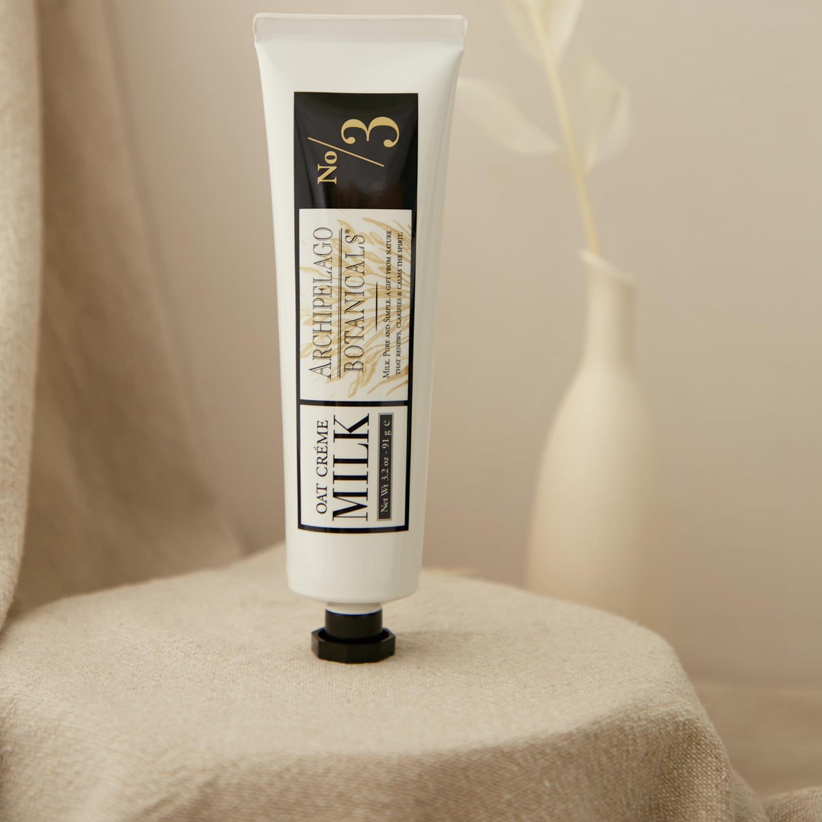 Visible dried milk solids and plant extracts on Archipelago Botanicals label