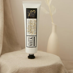 Visible dried milk solids and plant extracts on Archipelago Botanicals label