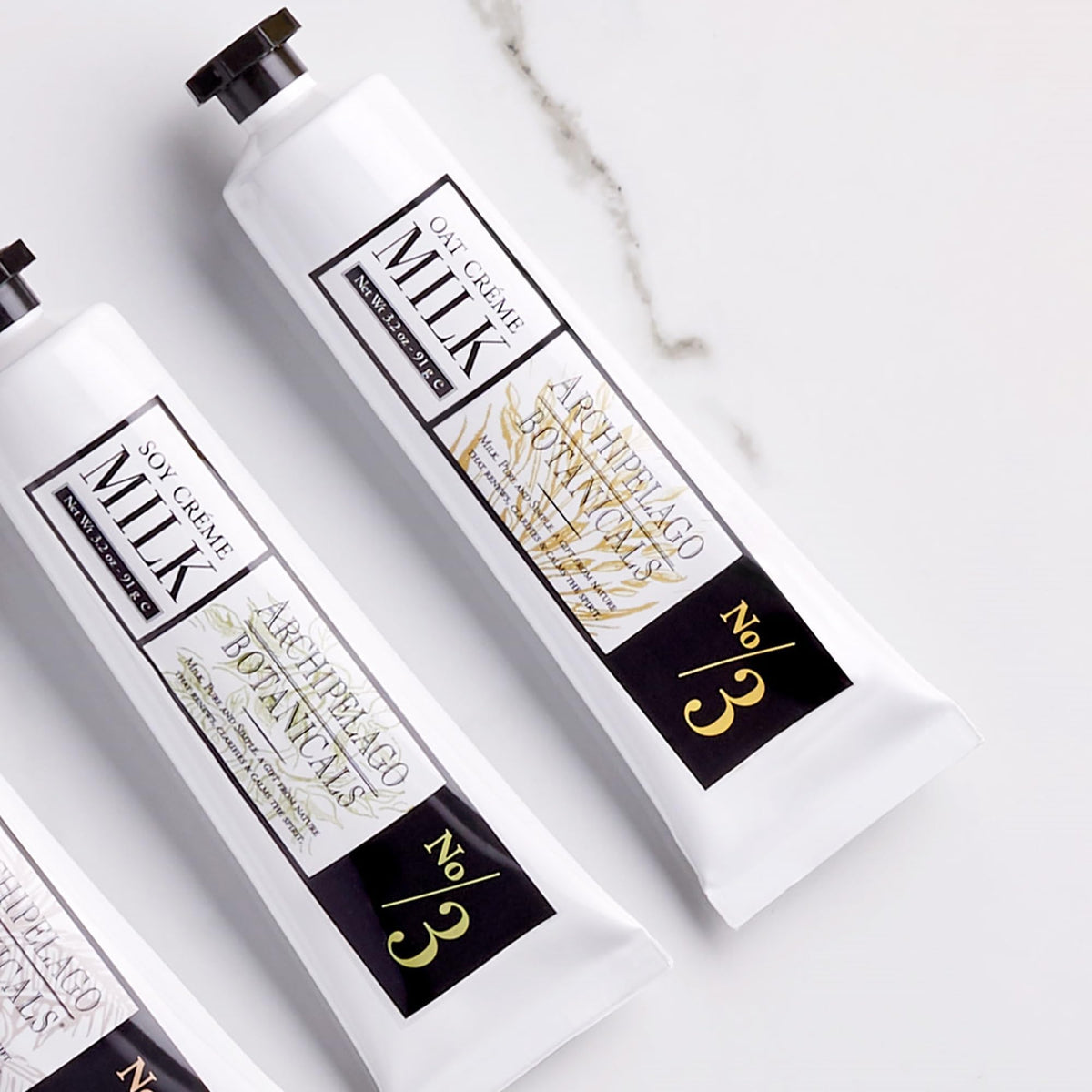 Pump dispenser and creamy swirl of Archipelago Botanicals hand crème