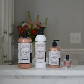 Archipelago Botanicals Charcoal Rose ingredients-closeup spotlights activated charcoal and rose oil benefits.