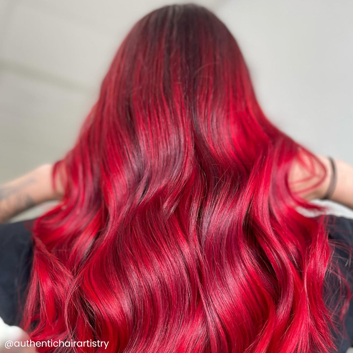 ARCTIC FOX Poison on pre-lightened hair shows vivid red on light bases.