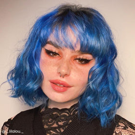 ARCTIC FOX Poseidon-blue application brush shows even color delivery.
