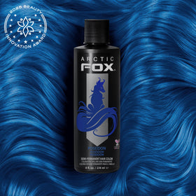 ARCTIC FOX Poseidon blue swatch on hair showing vibrant shade