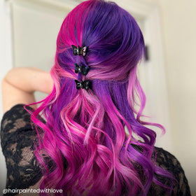 Hair strand shows after-application color on a strand with shine.