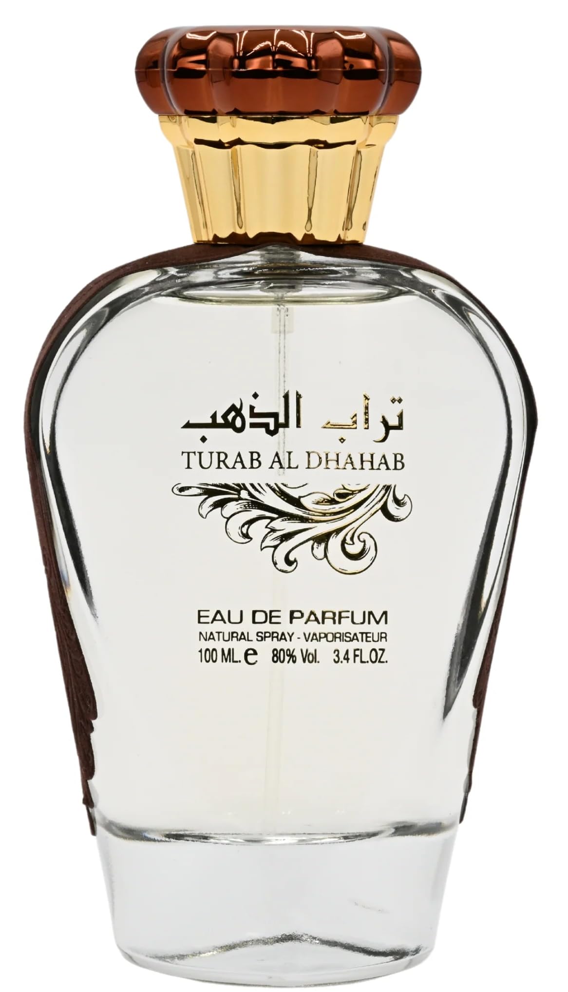 Ard Al Zaafaran Turab Al Dhahab bottle glows golden, evoking a luxurious evening fragrance.