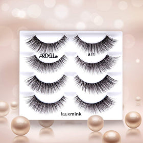 Model wearing Ardell Faux Mink 811 lashes for a natural wispy look