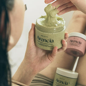 Arencia Fresh Cloud Sea Salt Scrub on a bathroom shelf for daily ritual.