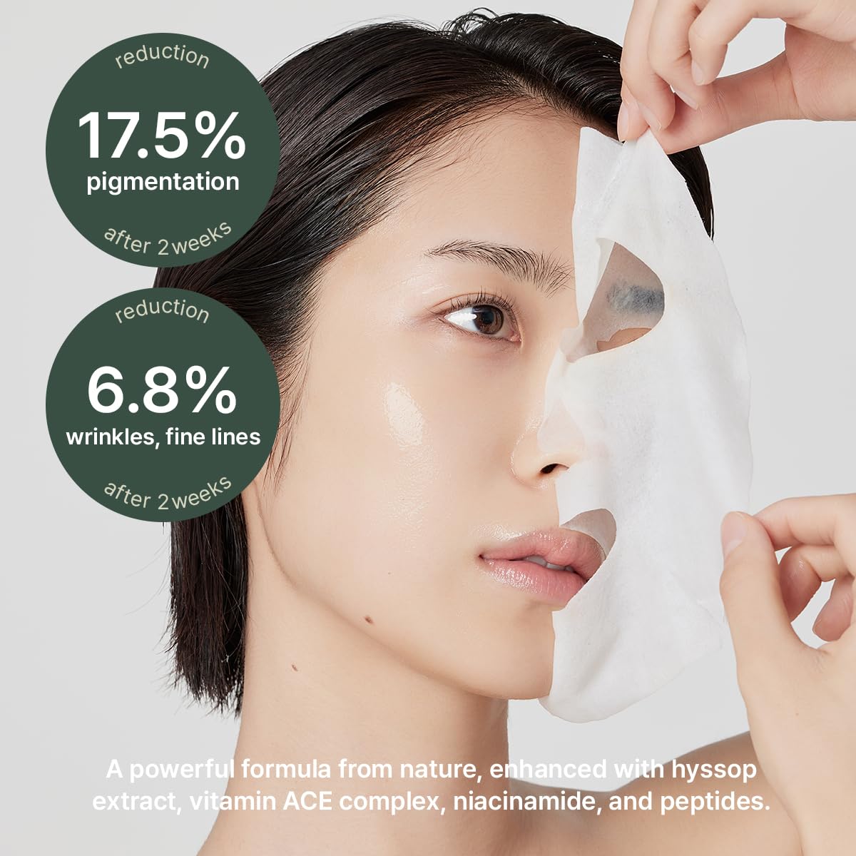 ARENCIA Hyssop Glow Sheet Mask during application for a radiant, revitalized complexion.
