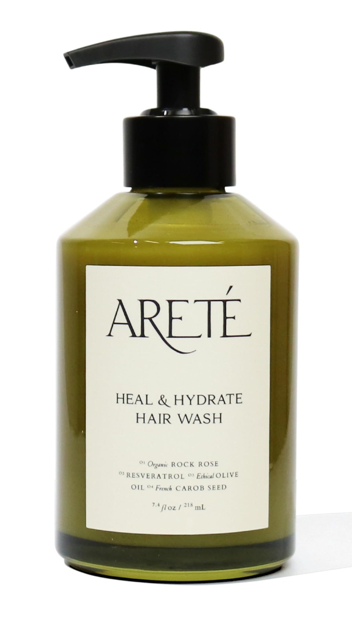 ARETÉ Heal & Hydrate shampoo bottle showcases organic ingredients for daily nourishment.