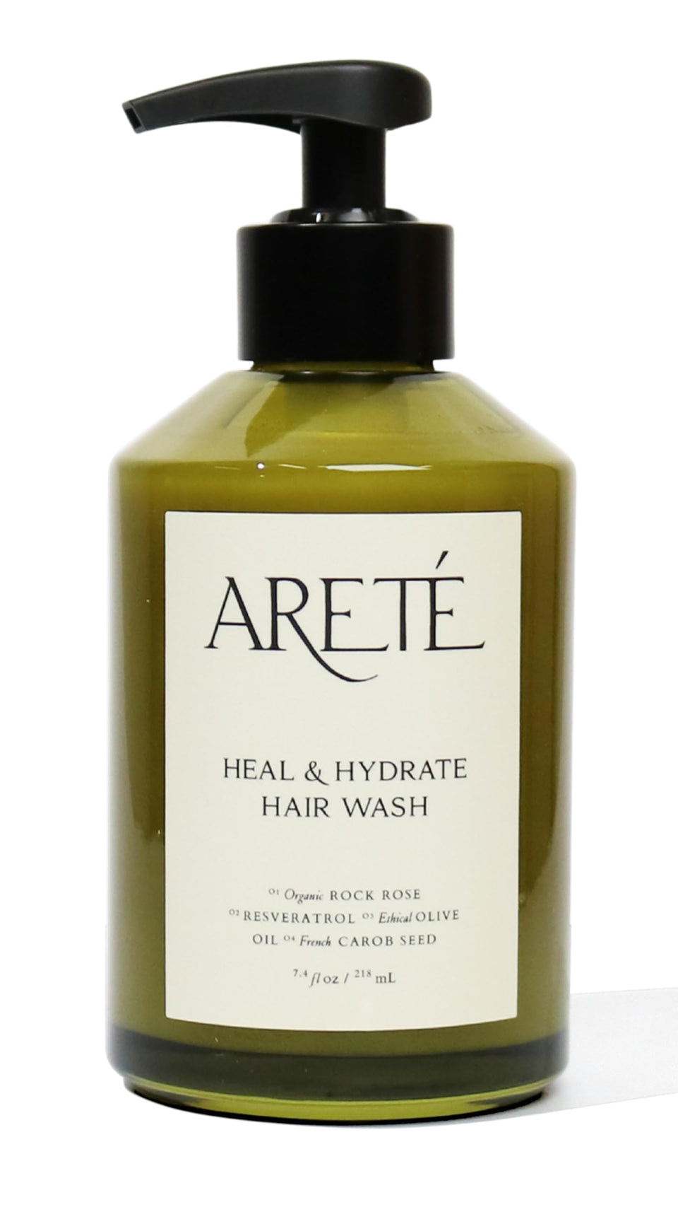 ARETÉ Heal & Hydrate shampoo bottle showcases organic ingredients for daily nourishment.