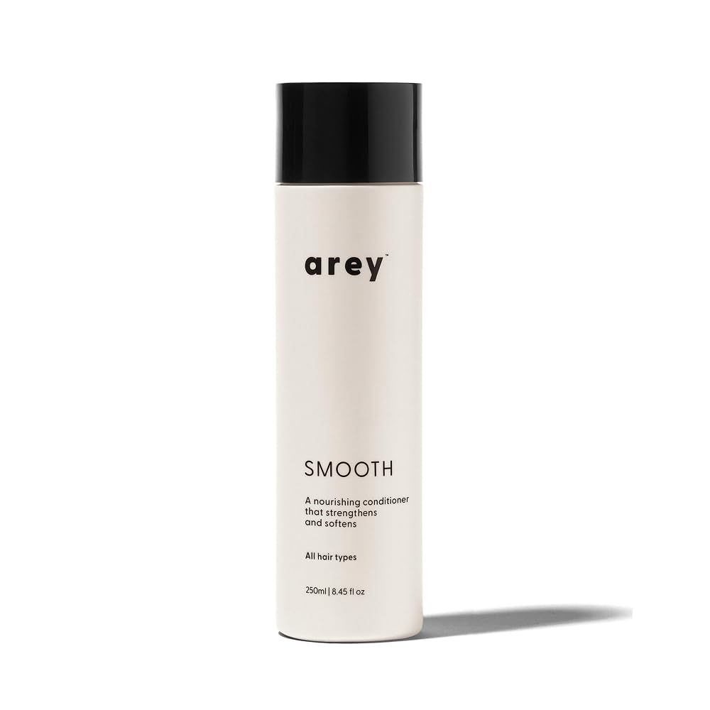 Arey Smooth Conditioner bottle front highlights lightweight hydration for smoother, more manageable hair.