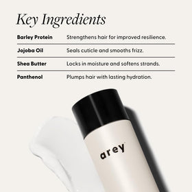 Arey Smooth Conditioner creamy texture close-up for frizz control and shine.