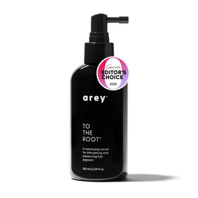 Arey To The Root bottle and pump show a lightweight, non-greasy scalp serum for daily use.