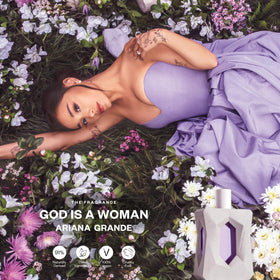 Ariana Grande God Is A Woman bottle close-up with a sleek pink label, compact design for travel