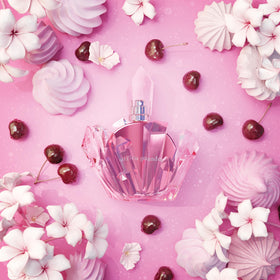 Ariana Grande r.e.m. Cherry Eclipse bottle angled shot highlights rich cherry and marshmallow heart.
